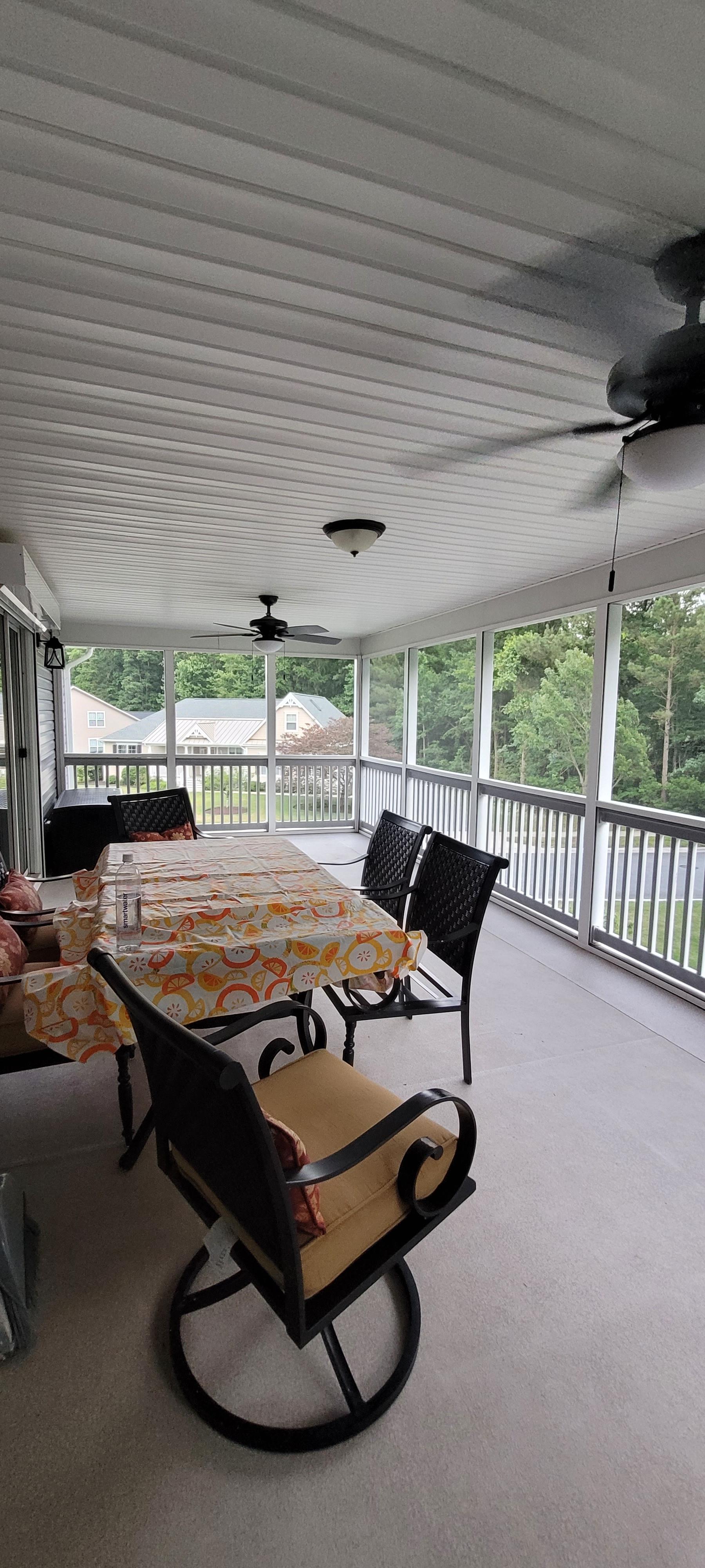 Elevated Screen Room with Picket Railing — view 1 of 2